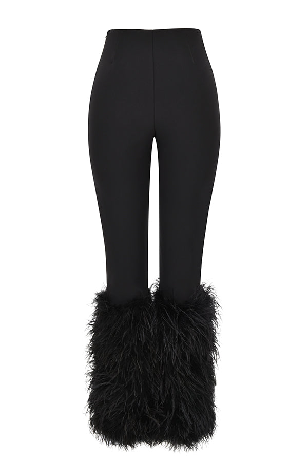 Svart sammetskorsett med beskurna byxor