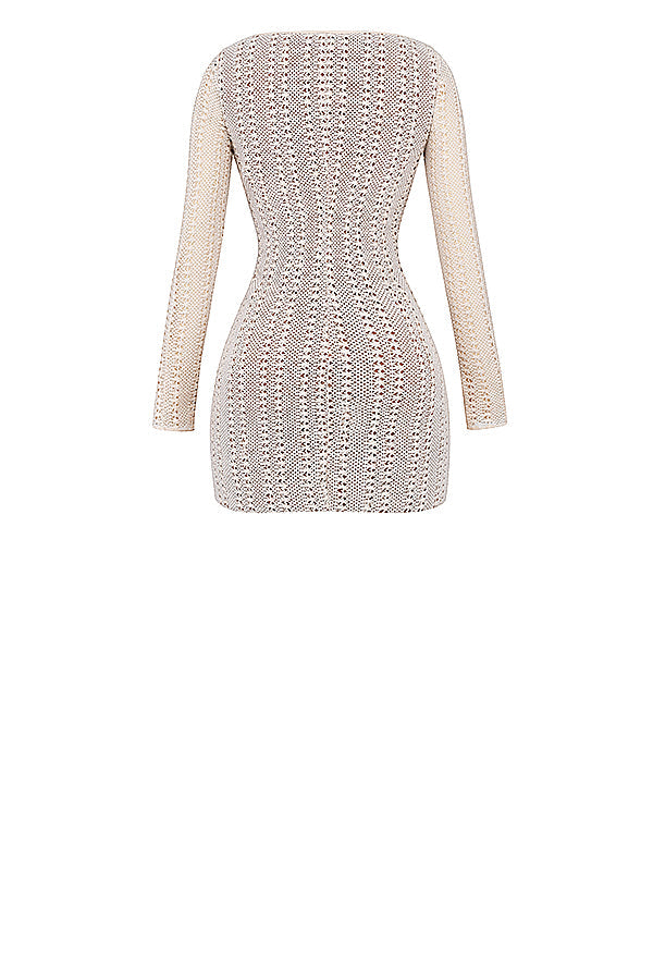 Naturstickad klänning med spetsar