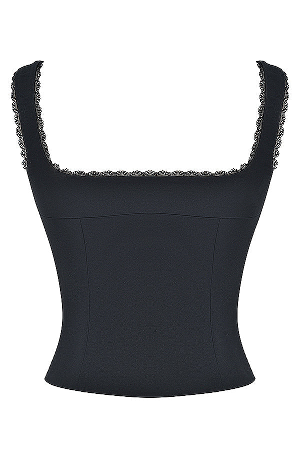 Topp med svart spetskant