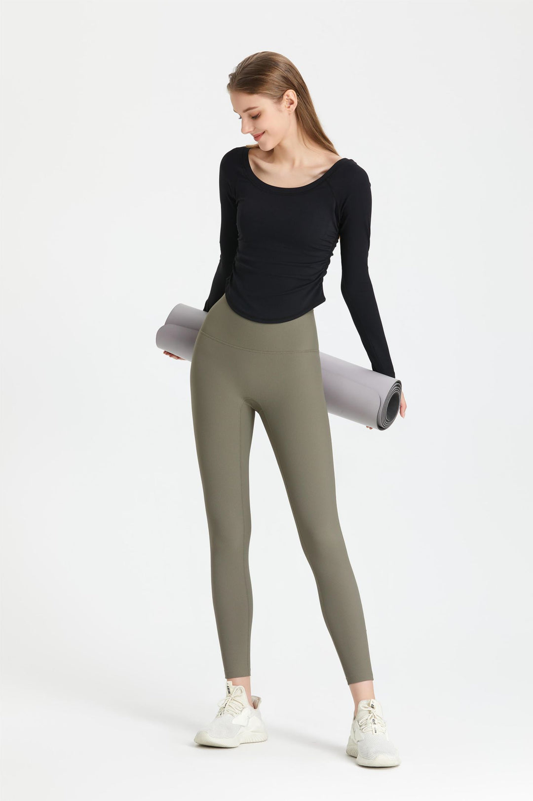 Topp med lå nga ärmar och volanger i sidorna