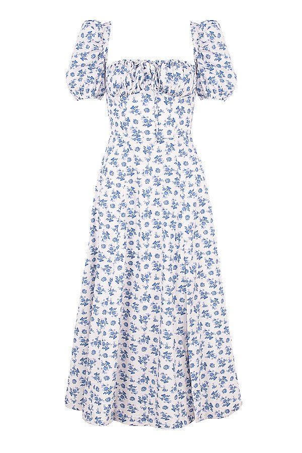 Midi solklänning med blommiga puffärmar
