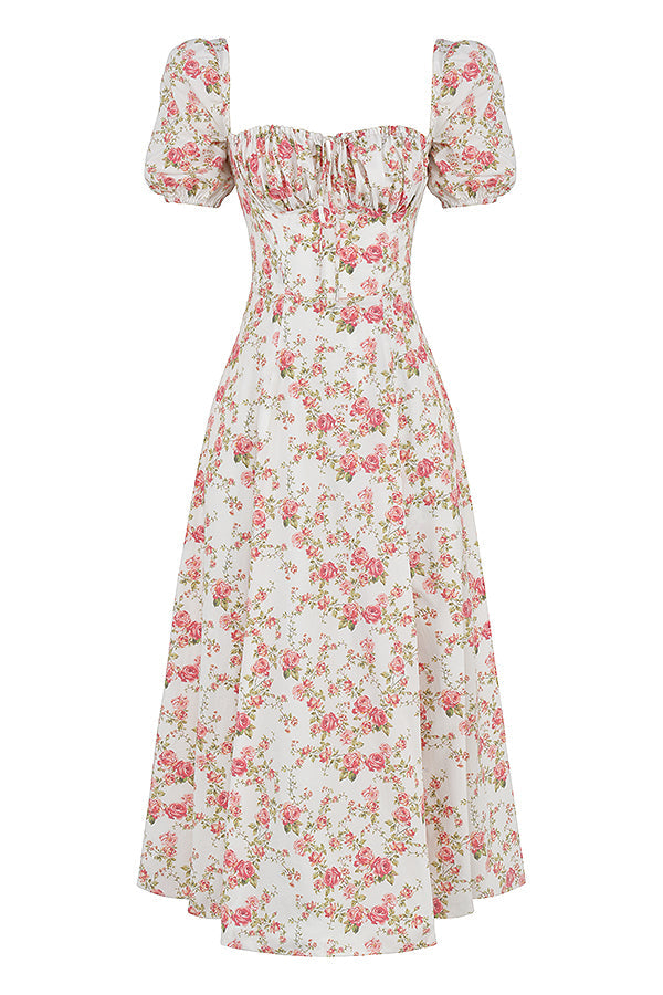 Midi solklänning med blommiga puffärmar