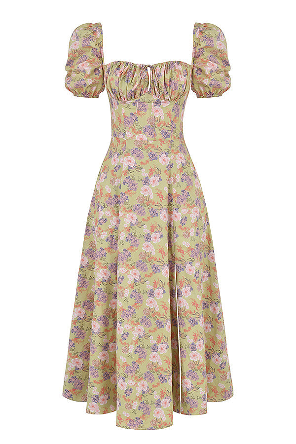 Midi solklänning med blommiga puffärmar