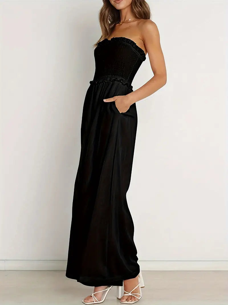 Svart jumpsuit med trasiga axlar