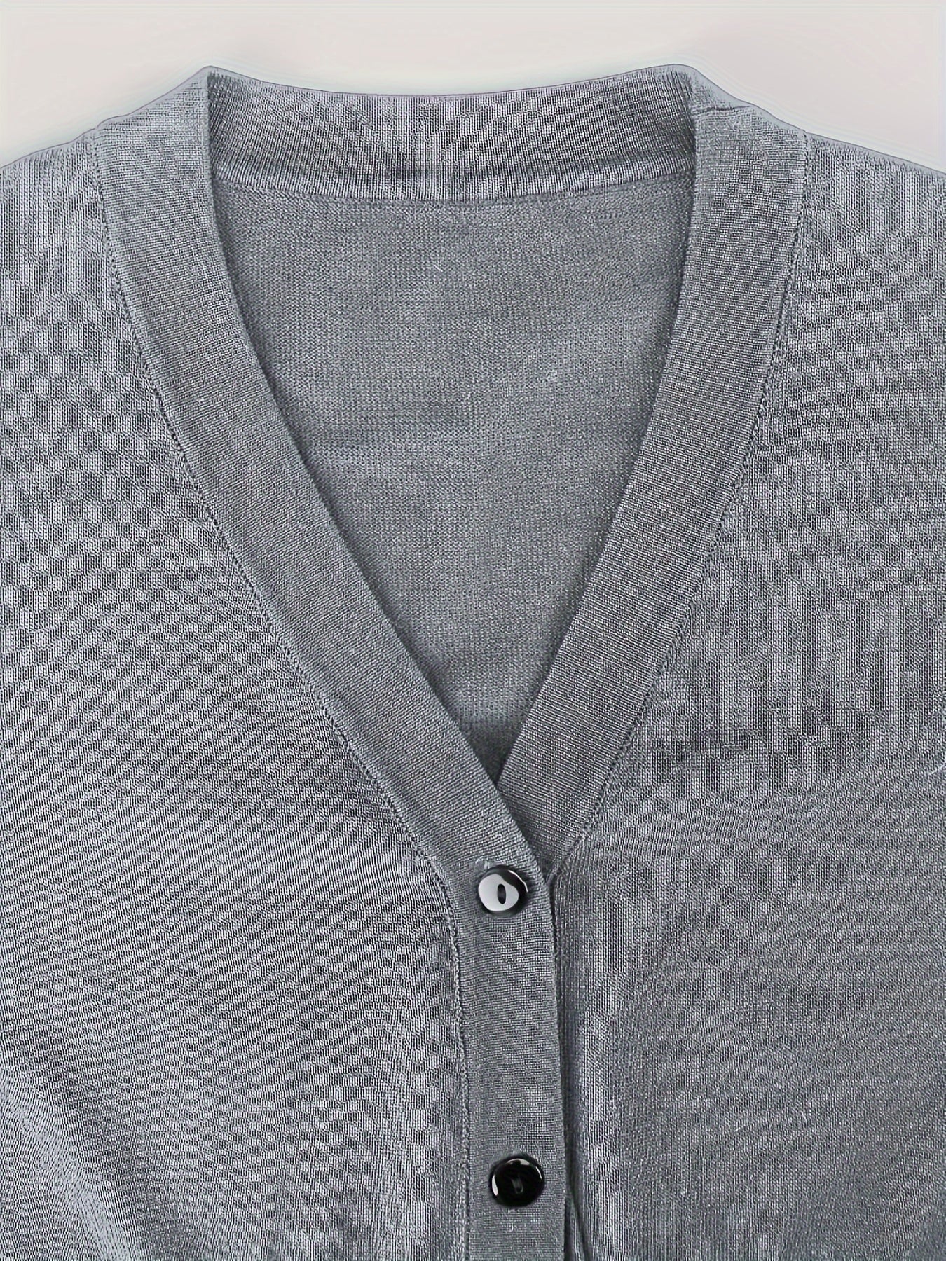 Bolero cardigan med knappstängning
