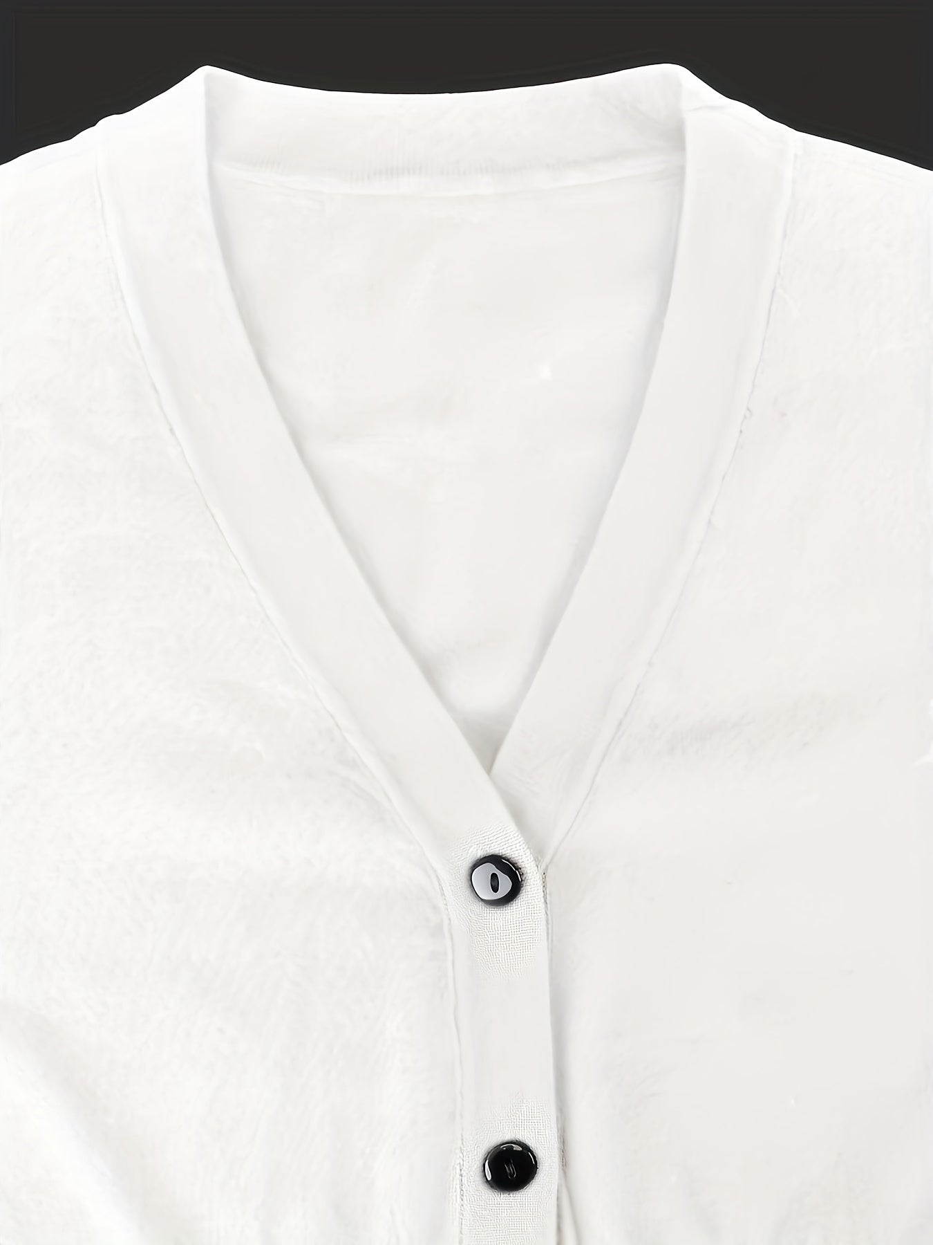 Bolero cardigan med knappstängning