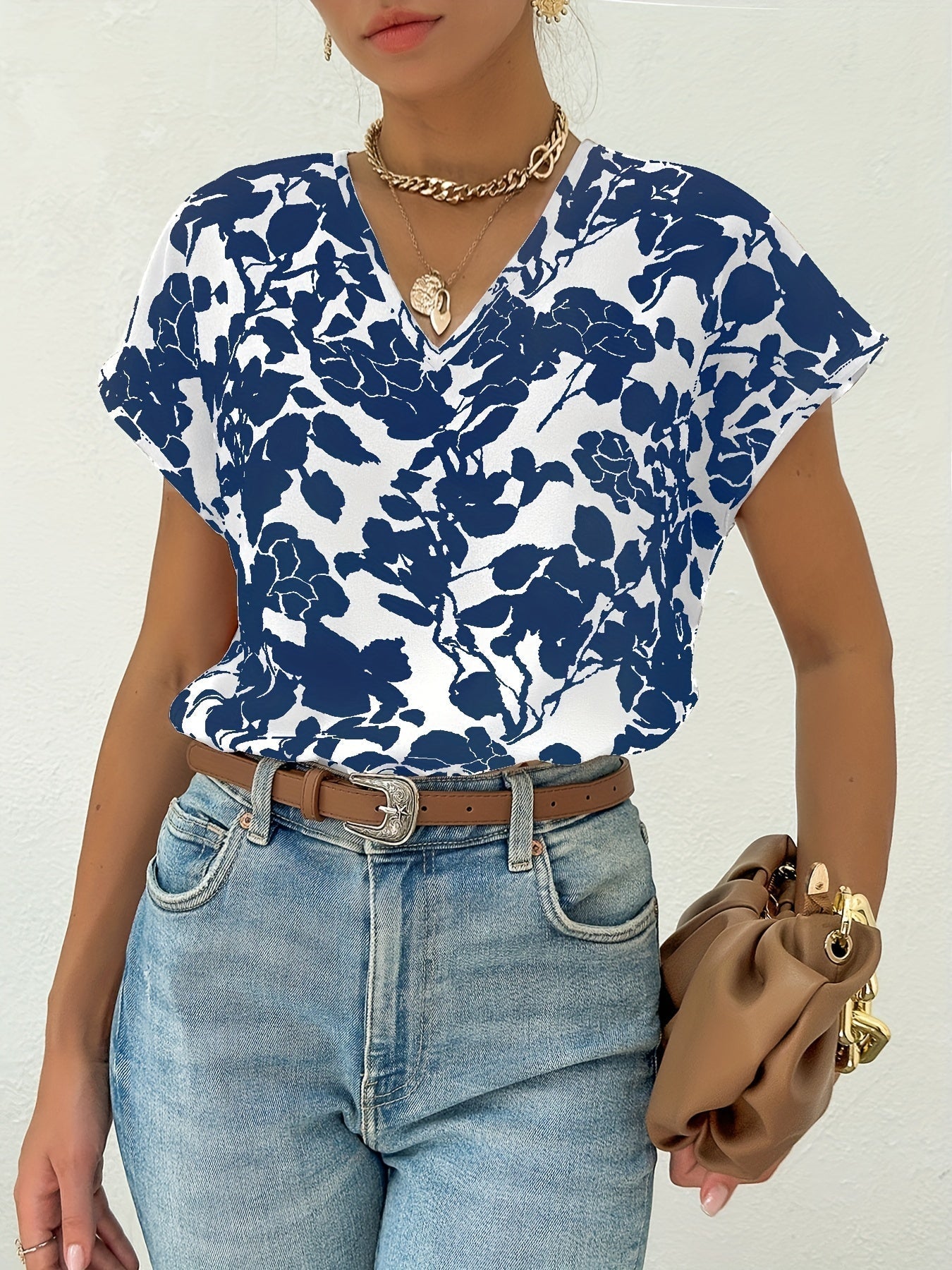 Blus med blommönster