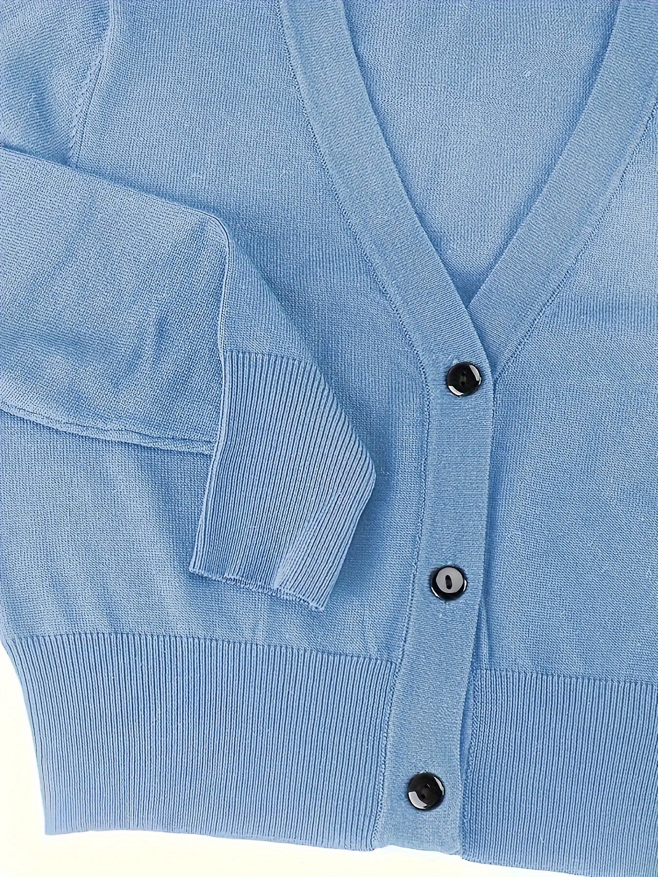 Bolero cardigan med knappstängning