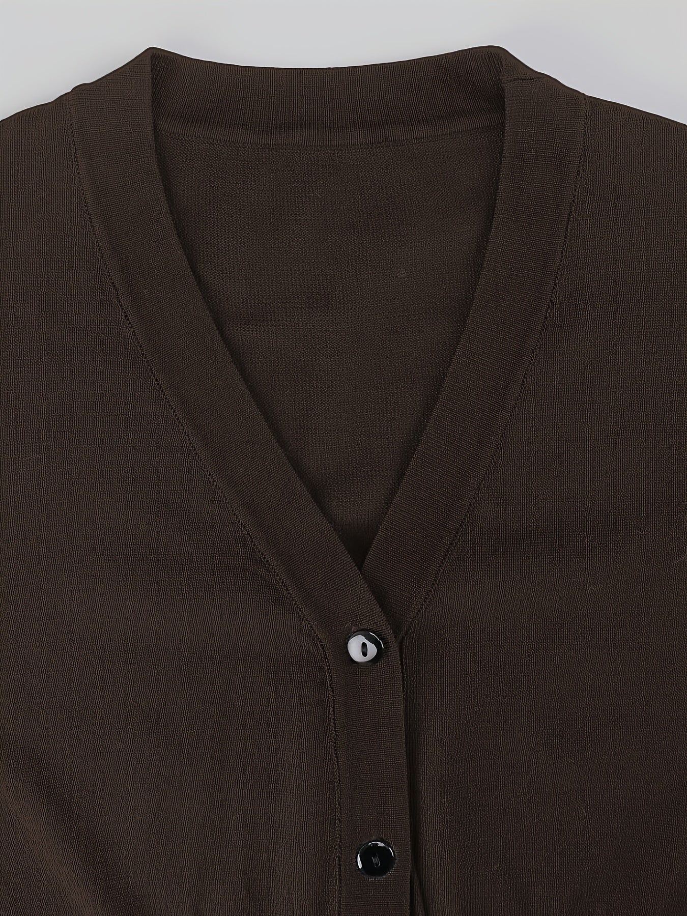 Bolero cardigan med knappstängning