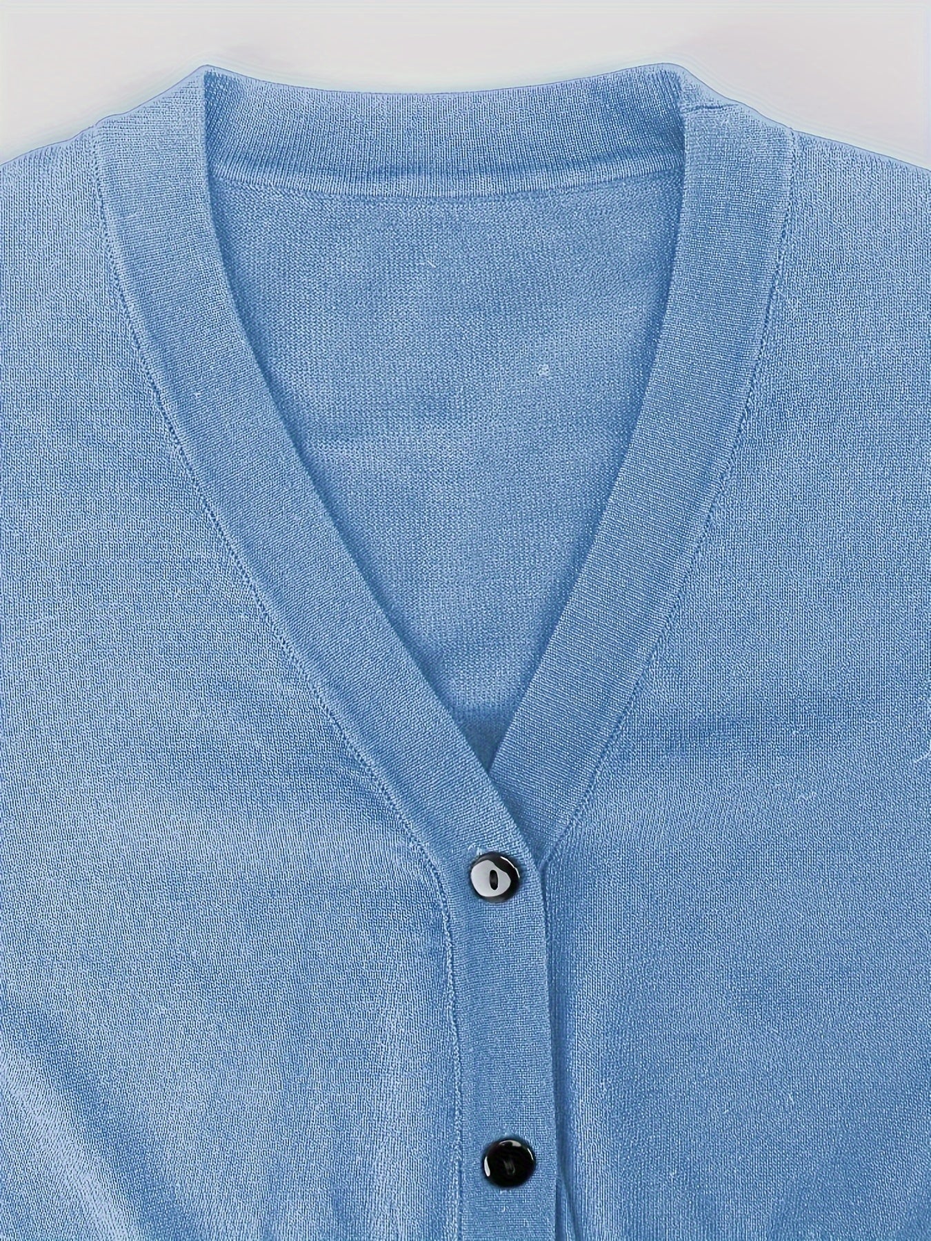 Bolero cardigan med knappstängning