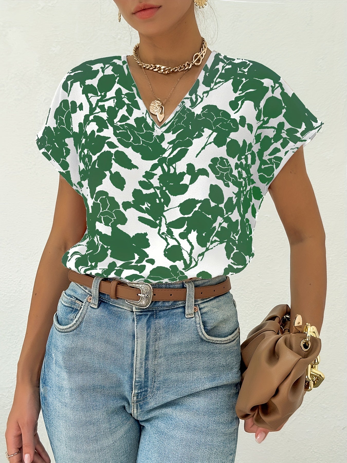 Blus med blommönster