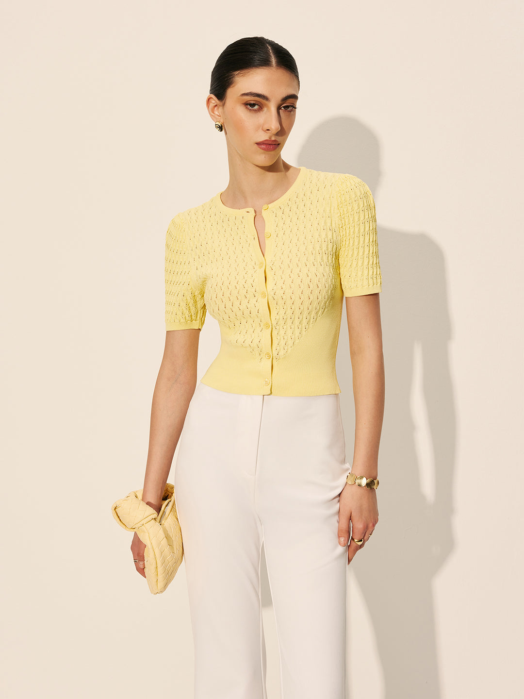 Ihålig stickad gul topp med knappar