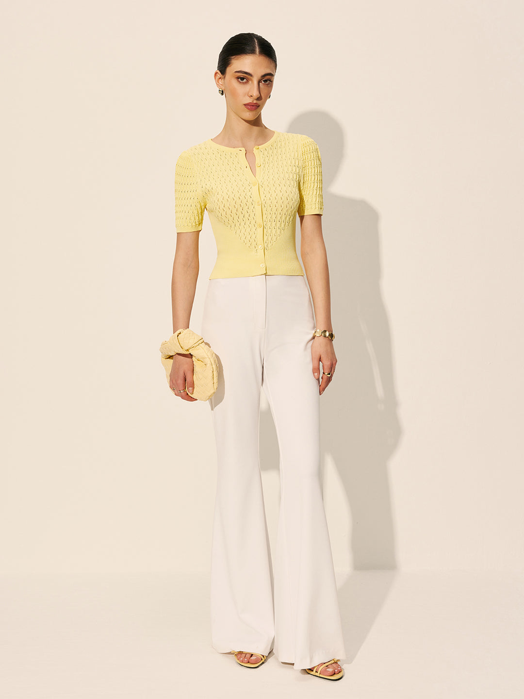 Ihålig stickad gul topp med knappar