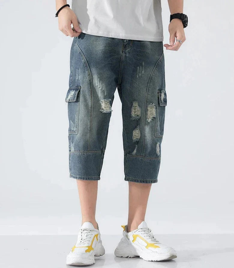 Lösa slitna jeansshorts