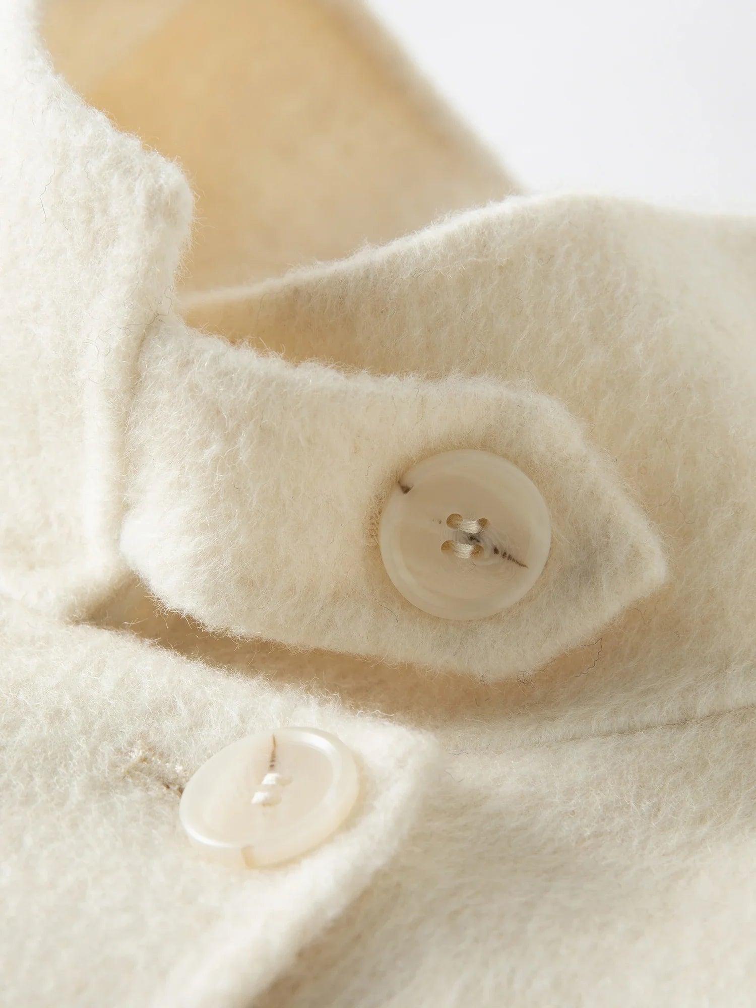 Lång ullkappa med dubbelsidig design