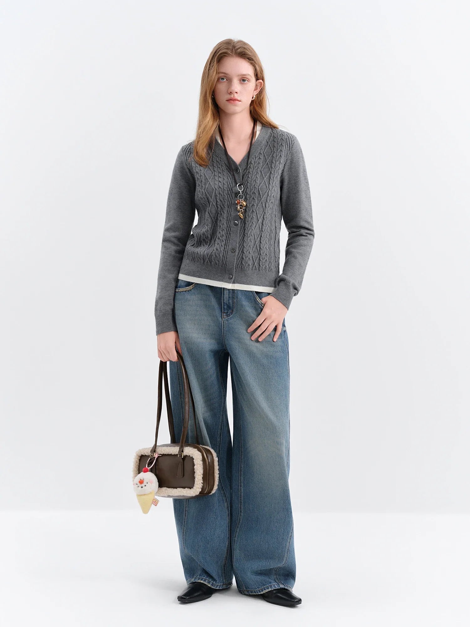 Stickad kofta i två delar