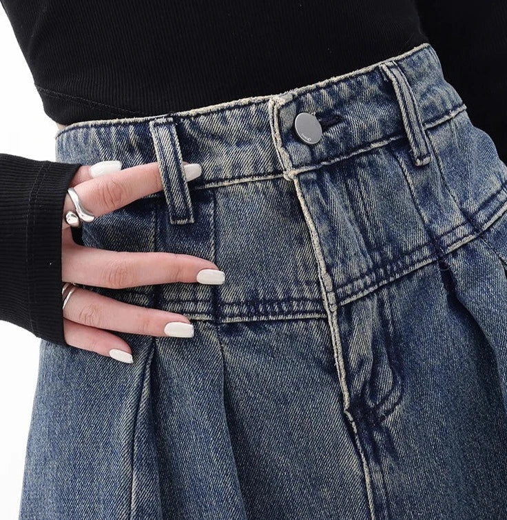 Högmidjade jeans med vida ben