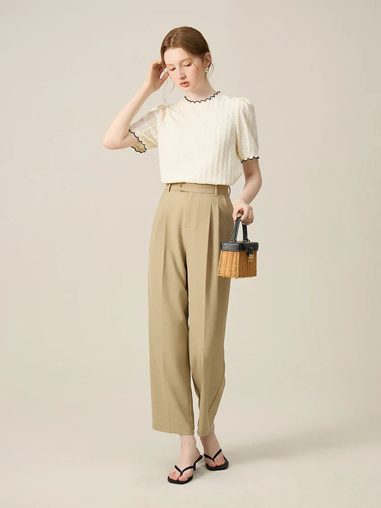 Tunn stickad ärmlös vit topp