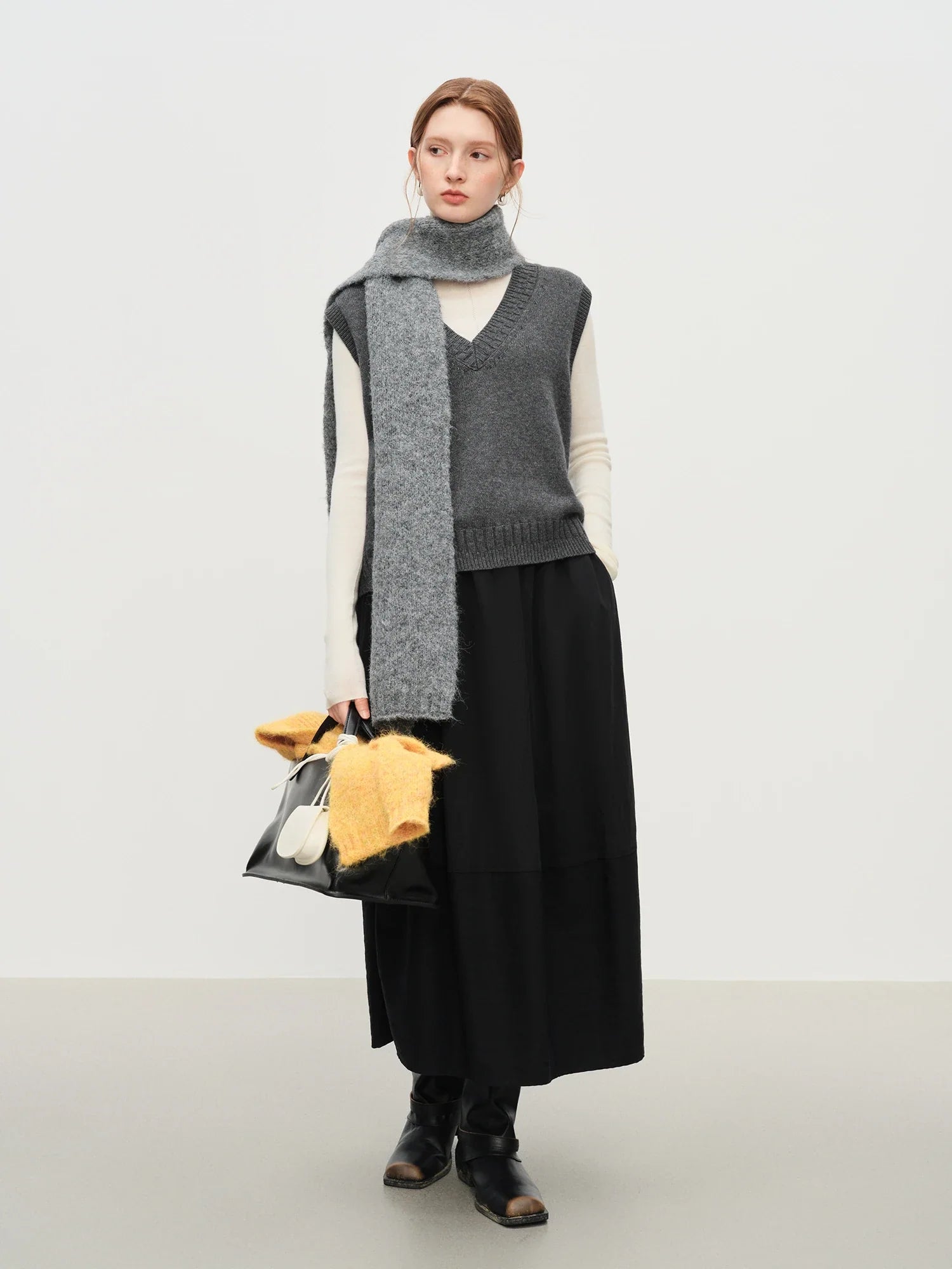 Ärmlös V-ringad ullväst