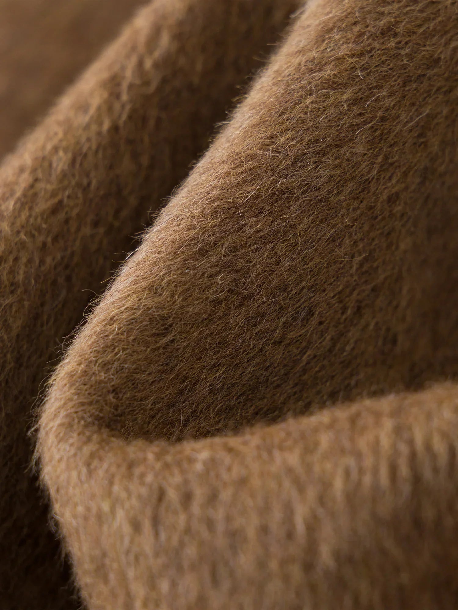 Liten dubbelsidig ullkappa