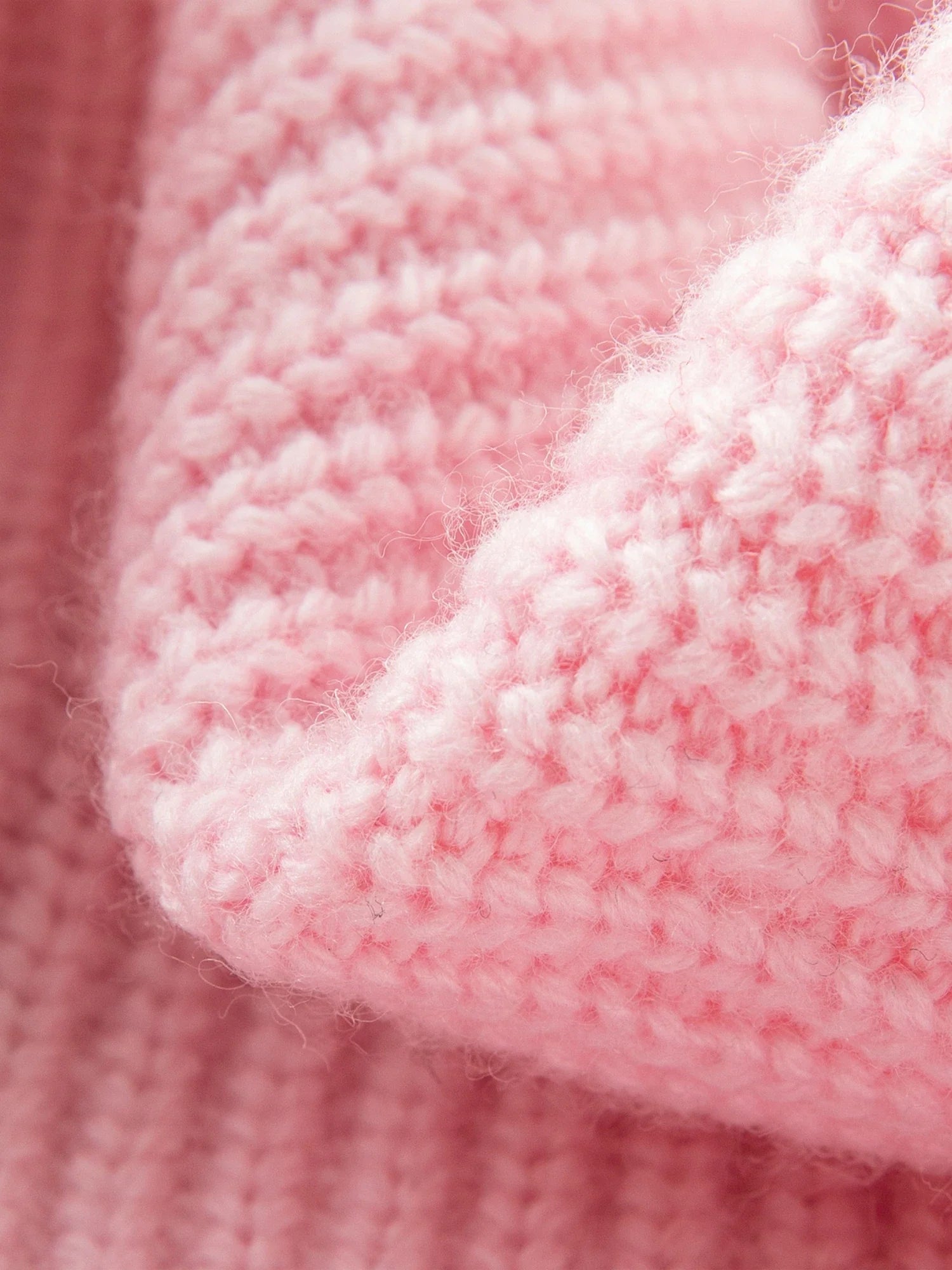 Stickad kofta i ullblandning med dubbel dragkedja