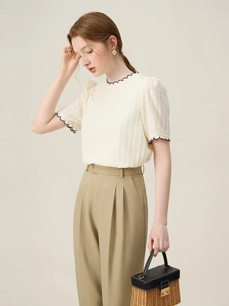 Tunn stickad ärmlös vit topp