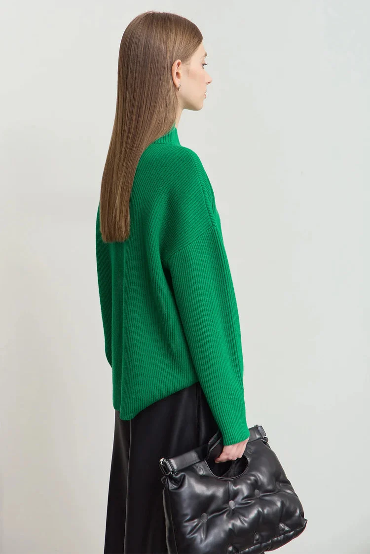 Stickad korsad polotröja