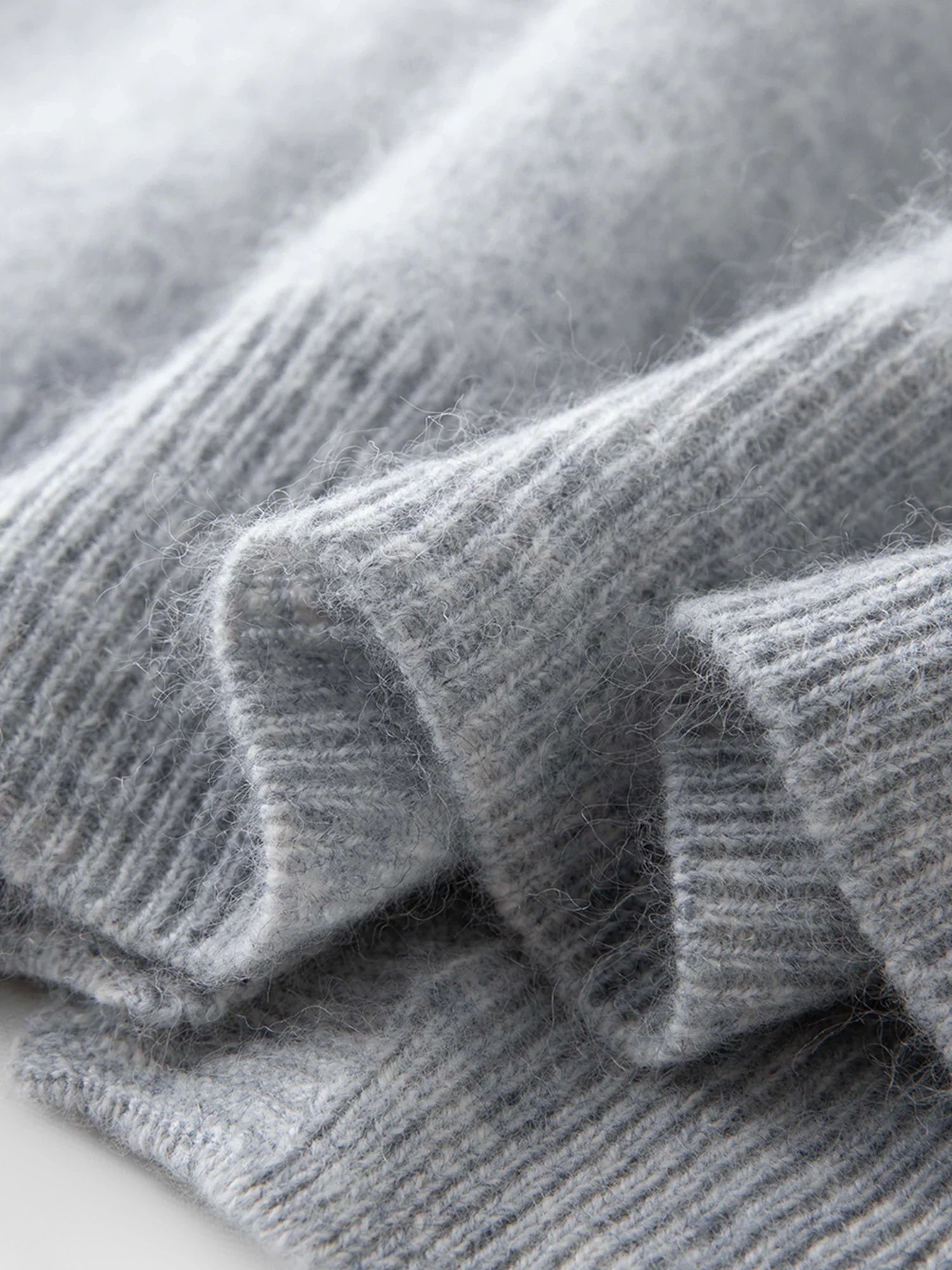 Stickad kofta i ullblandning