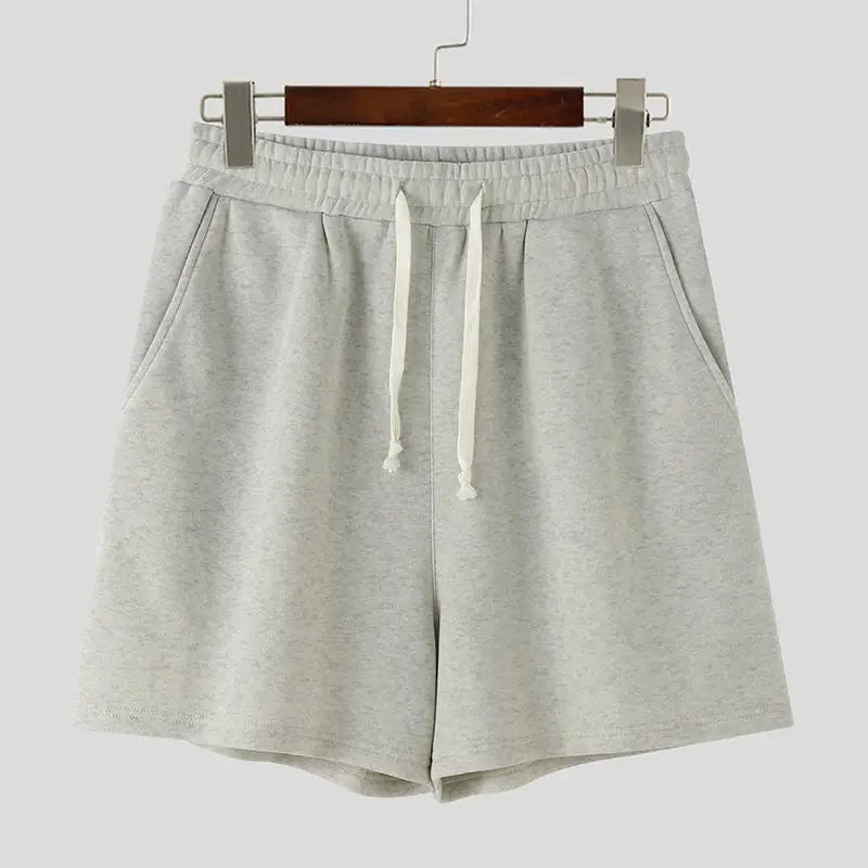 Lå ngärmad sweatshirt och huvshorts