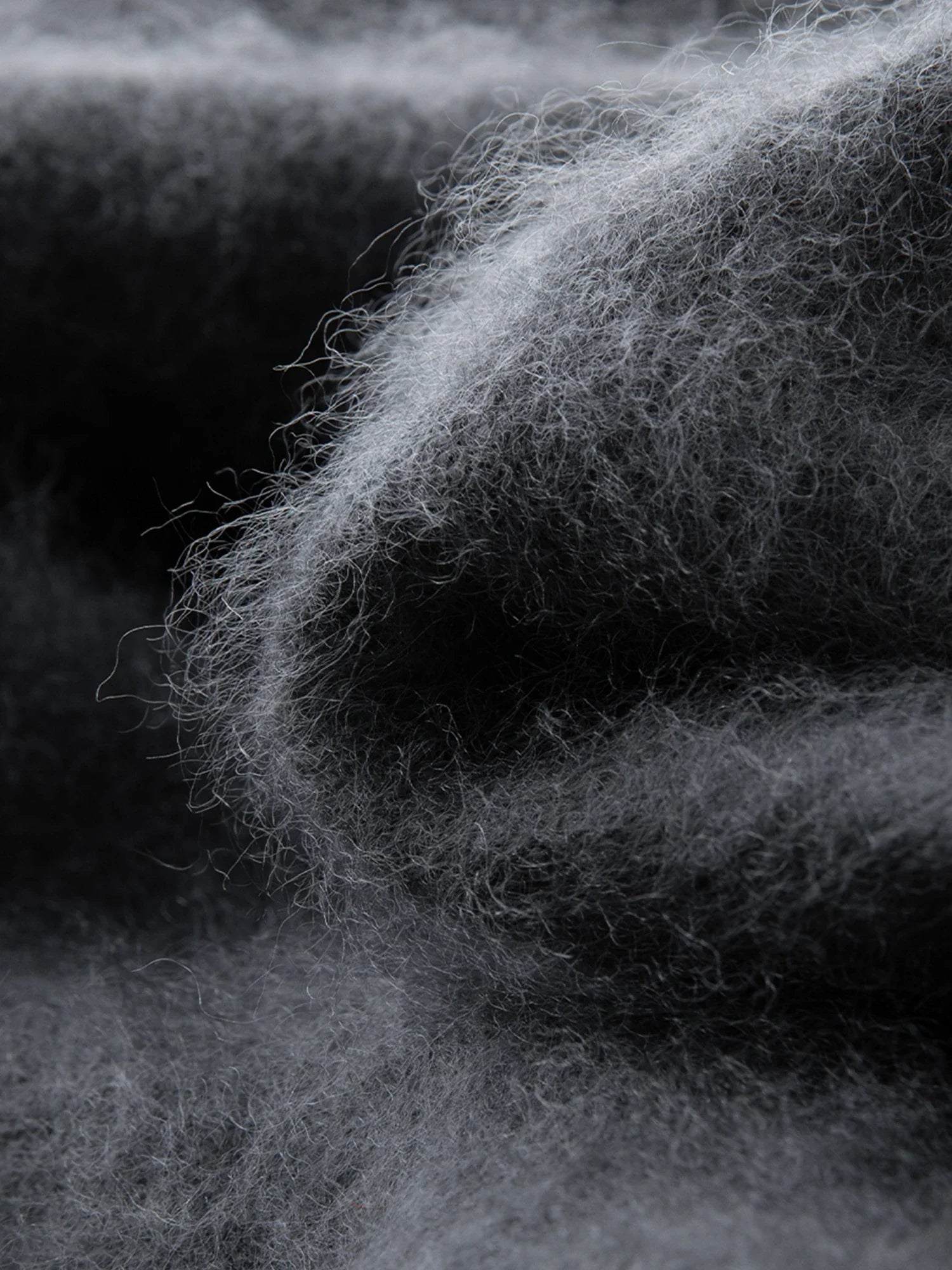 Stickad kofta i ullblandning