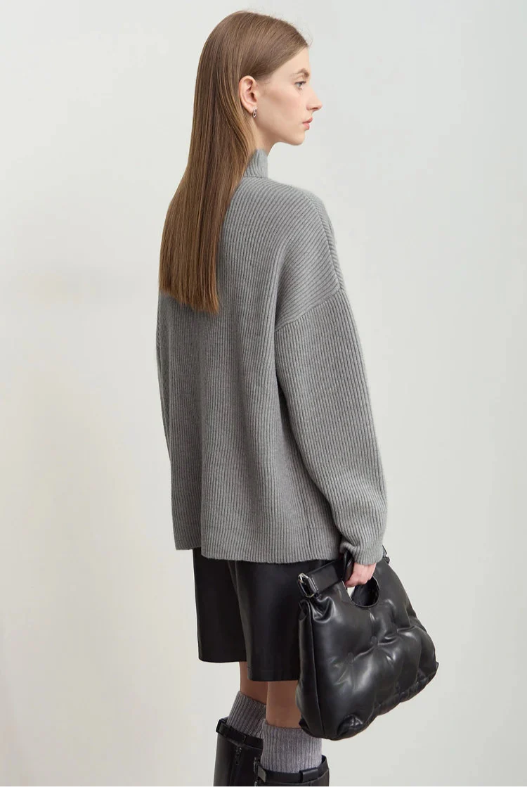 Stickad korsad polotröja