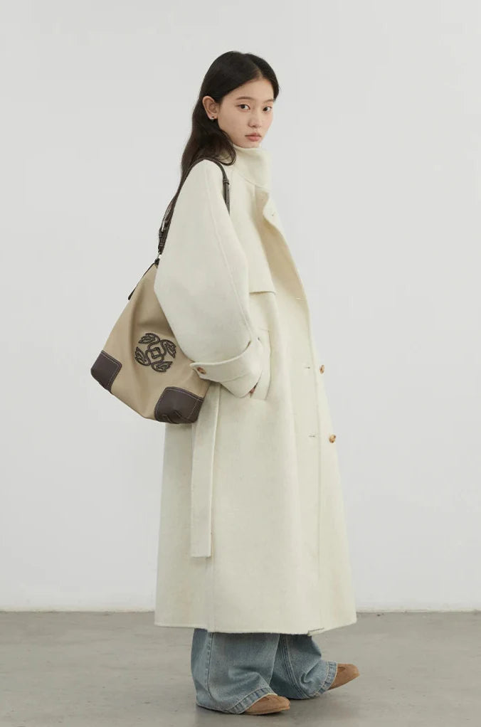 Dubbelsidig ullkappa