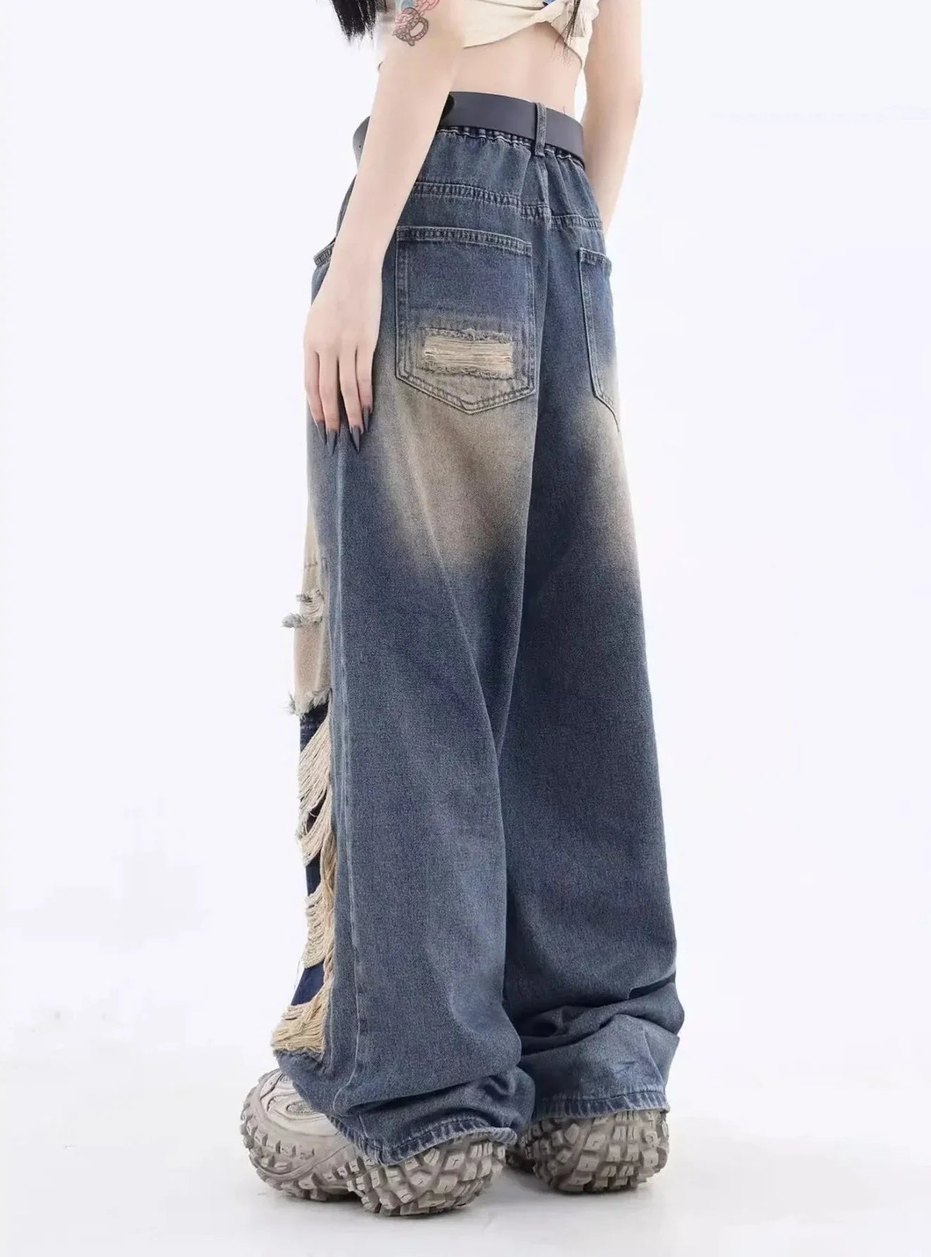 Slitna lösa jeans