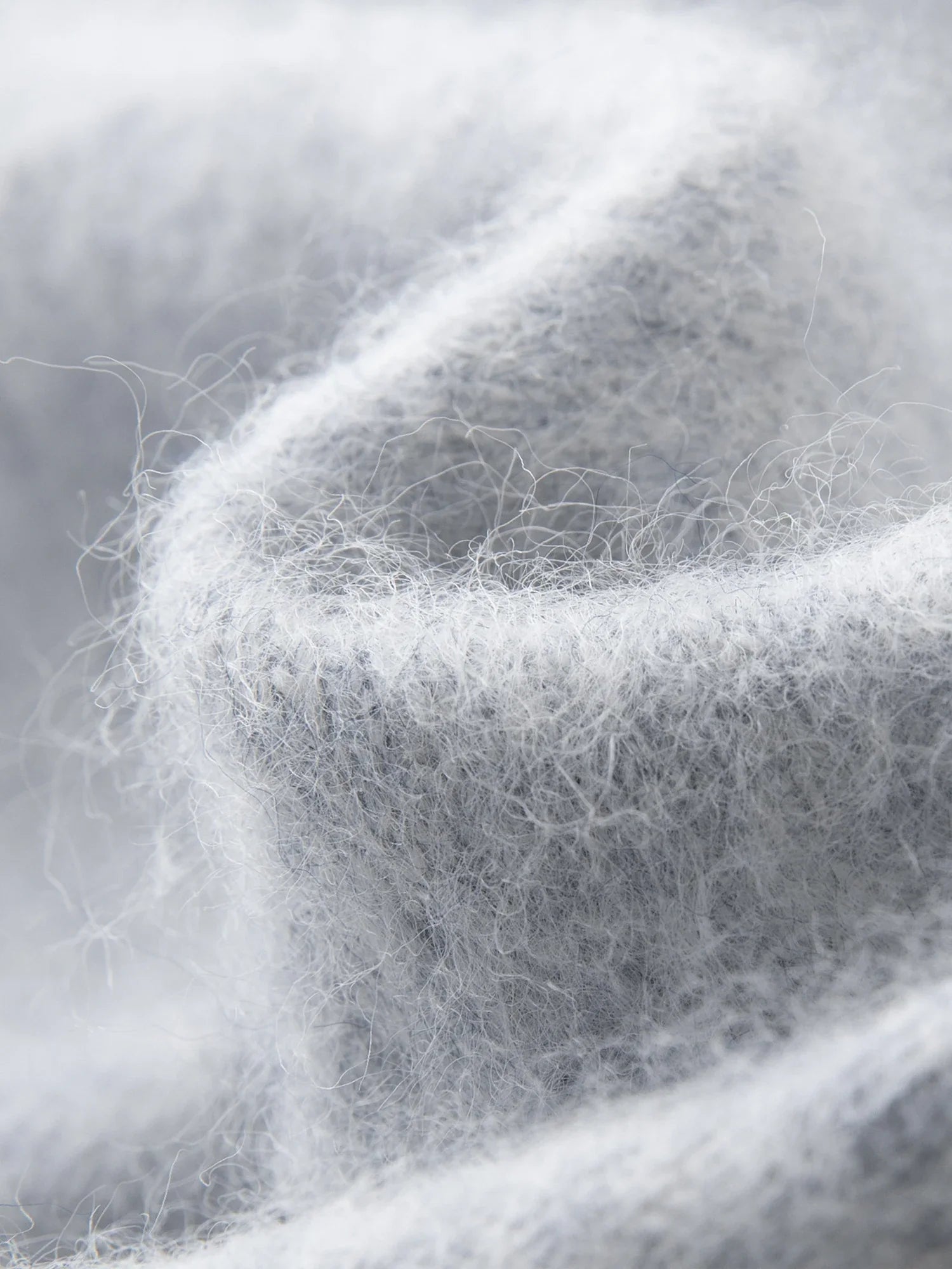 Stickad kofta i ullblandning