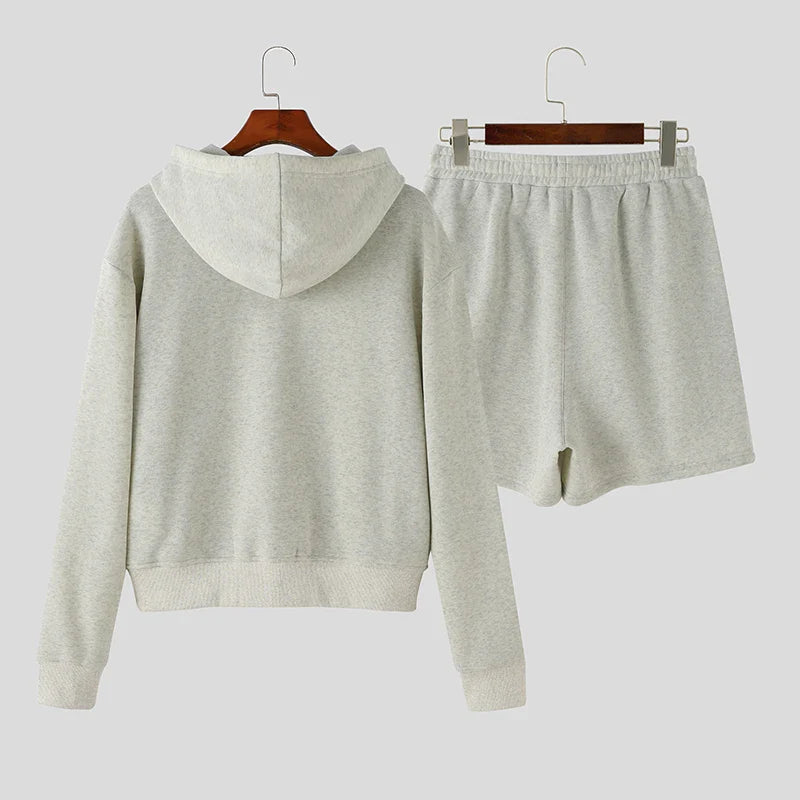 Lå ngärmad sweatshirt och huvshorts