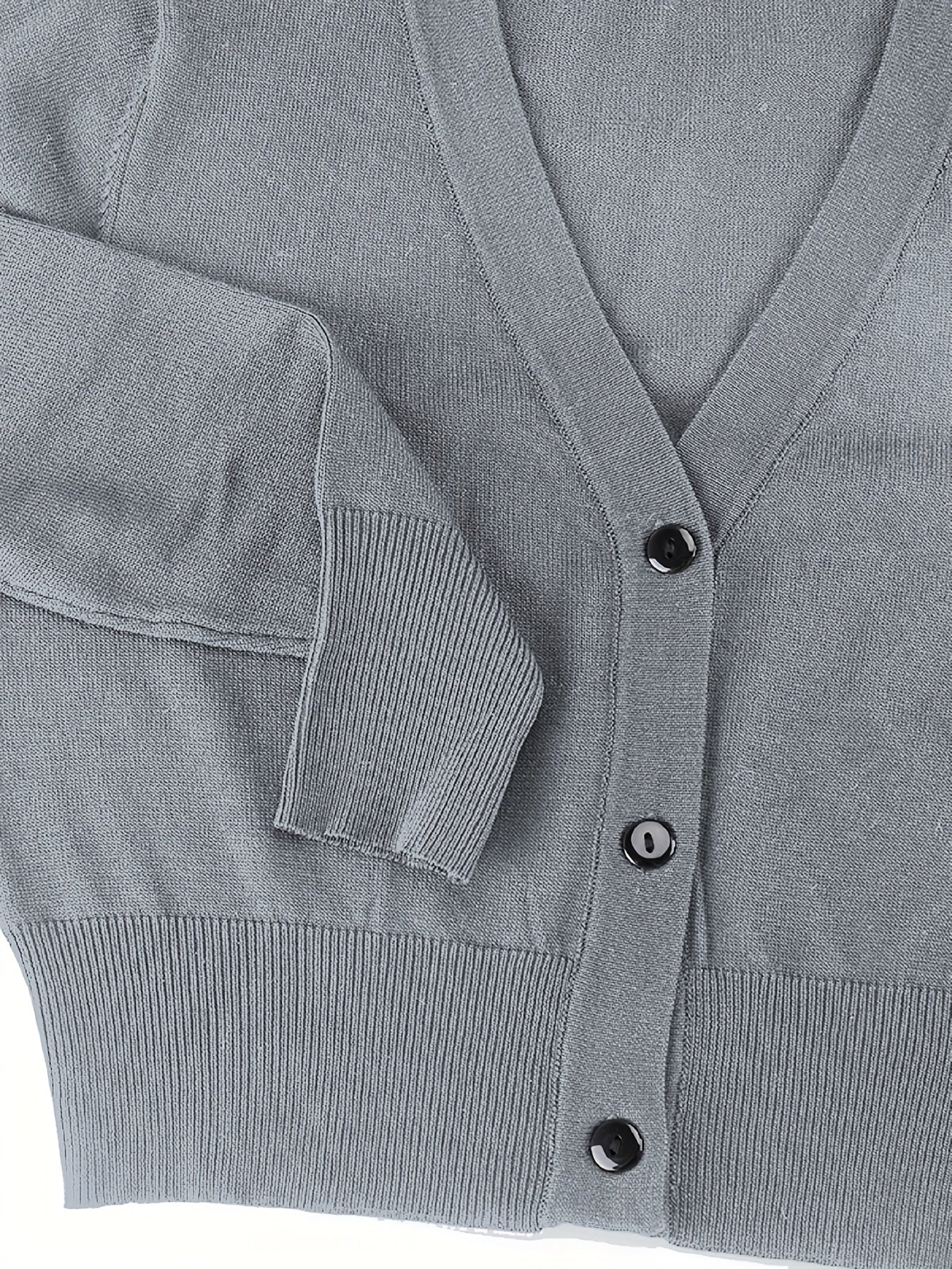 Bolero cardigan med knappstängning