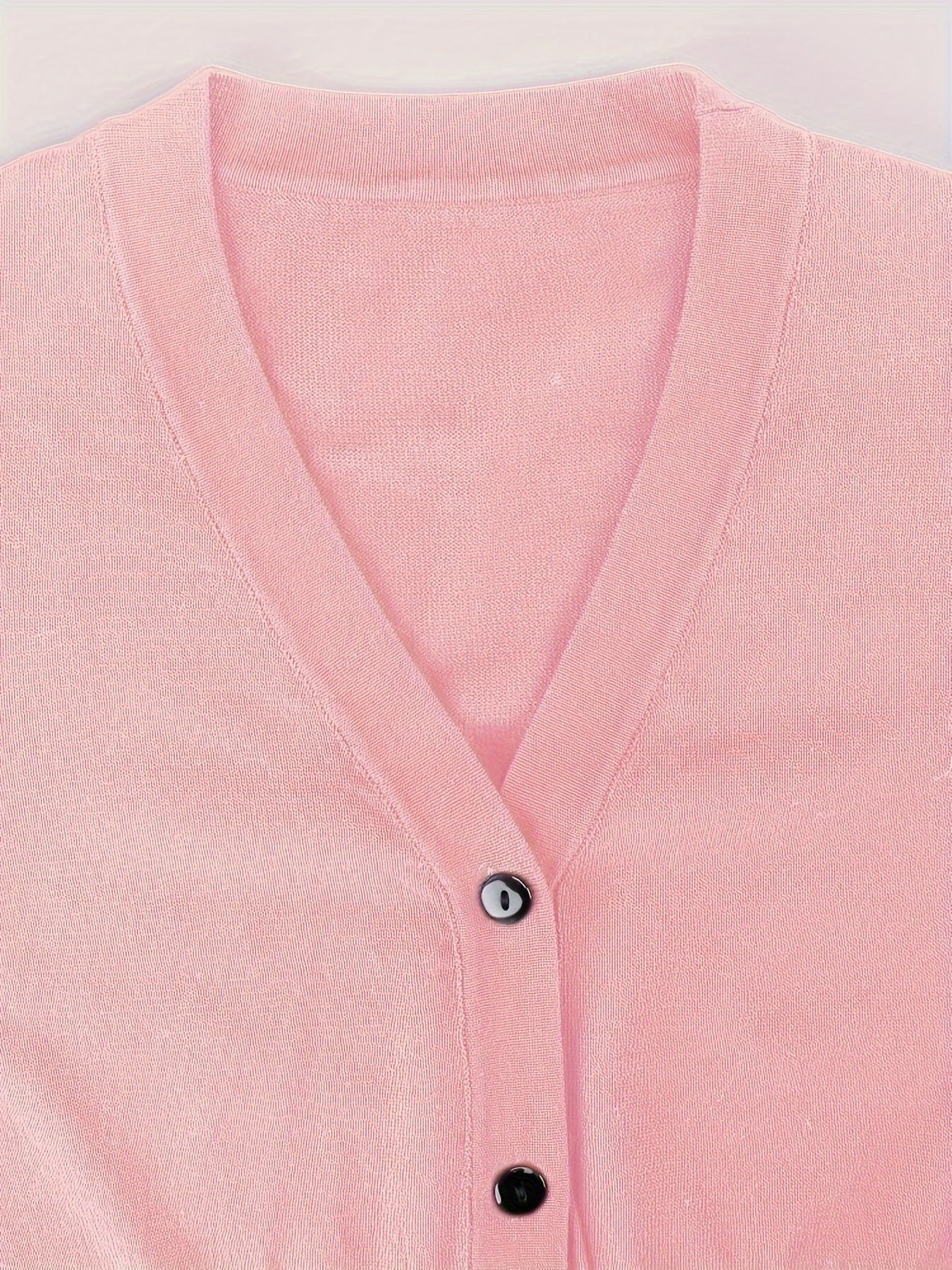 Bolero cardigan med knappstängning