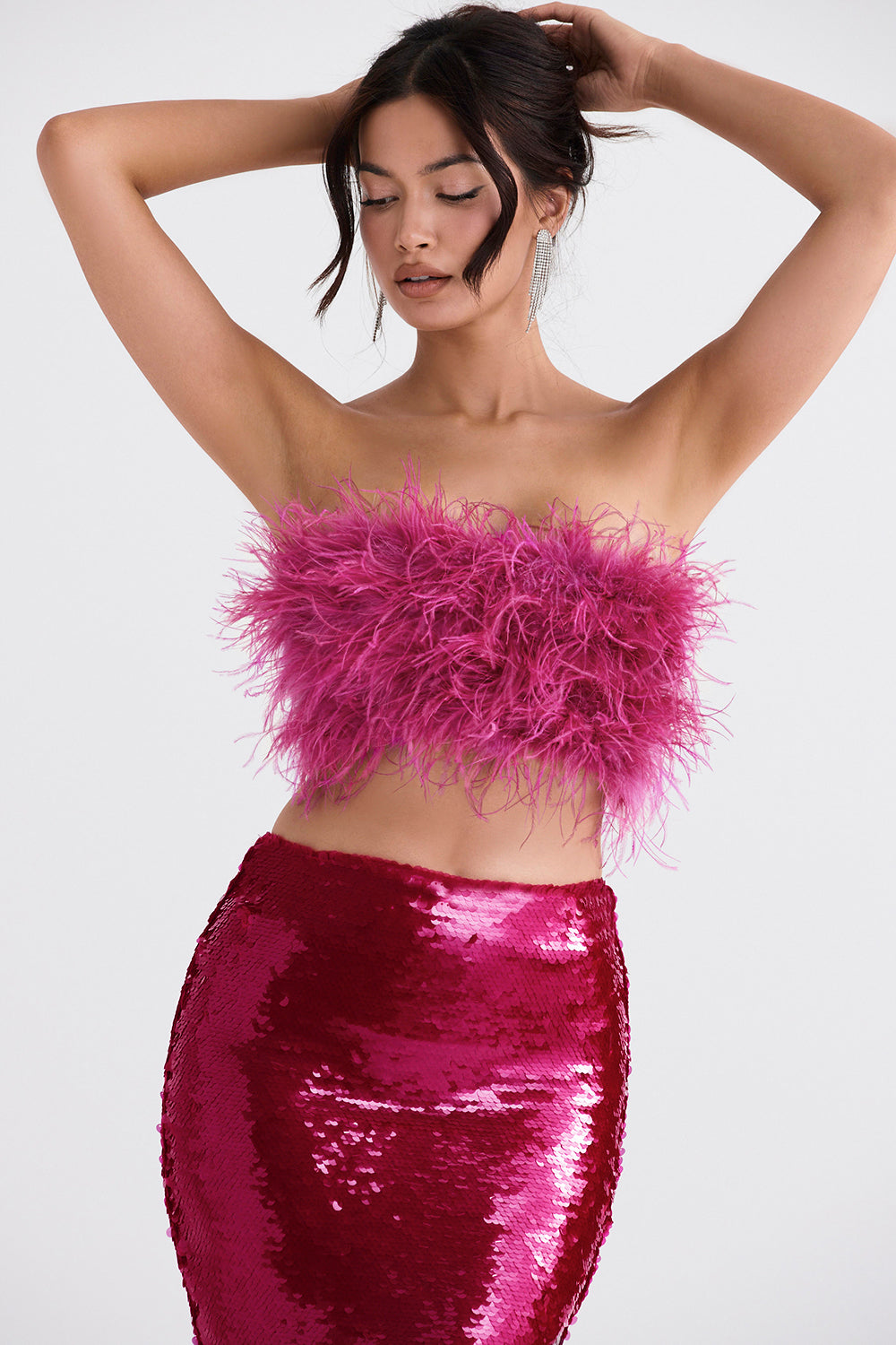 Ljust rosa bandeau med paljetter och maxikjol
