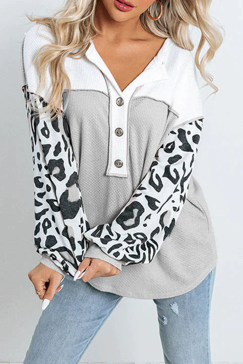 Patchwork vå ffelstickad topp med leopardärmar