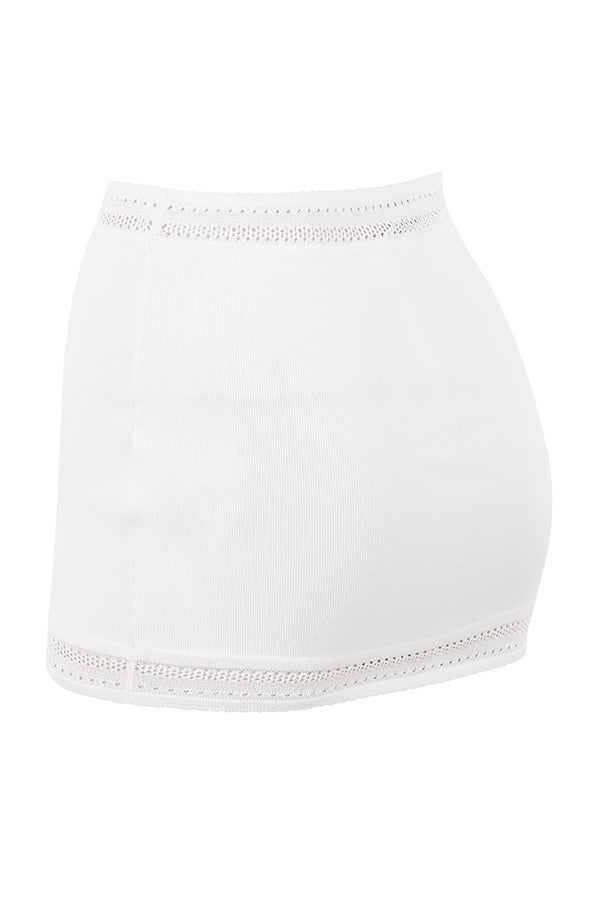 Elfenbensfärgad elegant ribbstickad topp med minikjol