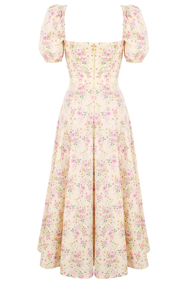 Midi solklänning med blommiga puffärmar