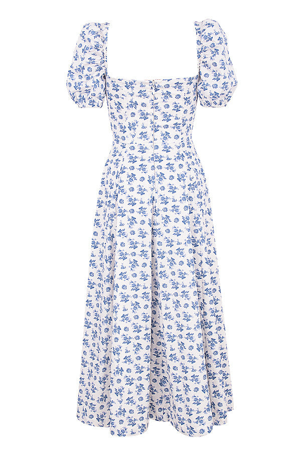 Midi solklänning med blommiga puffärmar