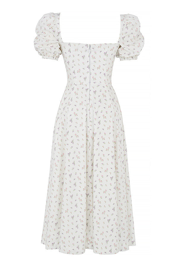 Midi solklänning med blommiga puffärmar