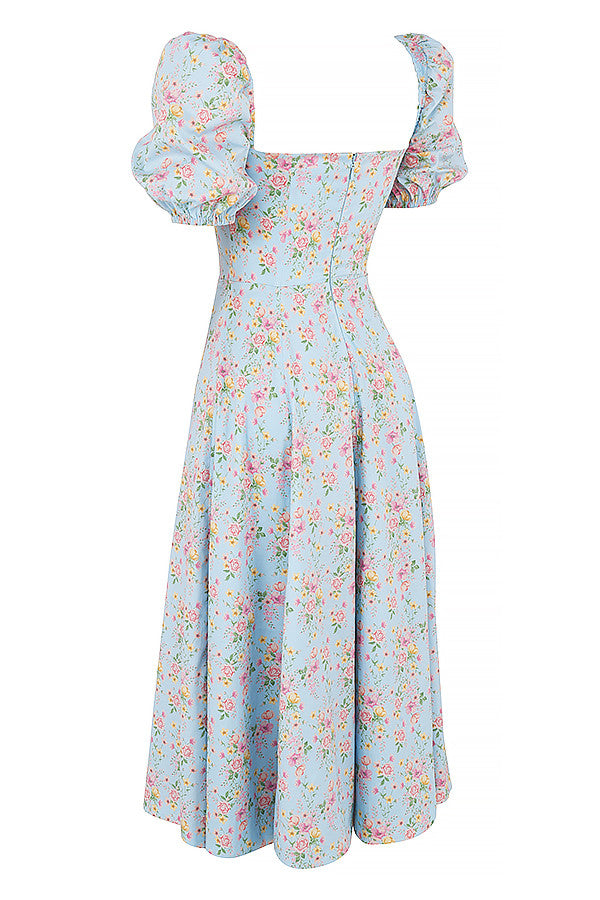 Midi solklänning med blommiga puffärmar