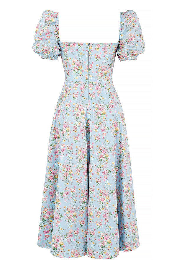 Midi solklänning med blommiga puffärmar