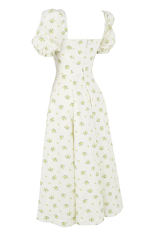 Midi solklänning med blommiga puffärmar