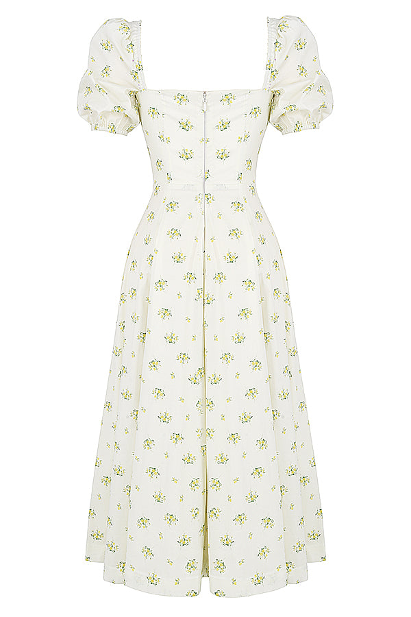 Midi solklänning med blommiga puffärmar