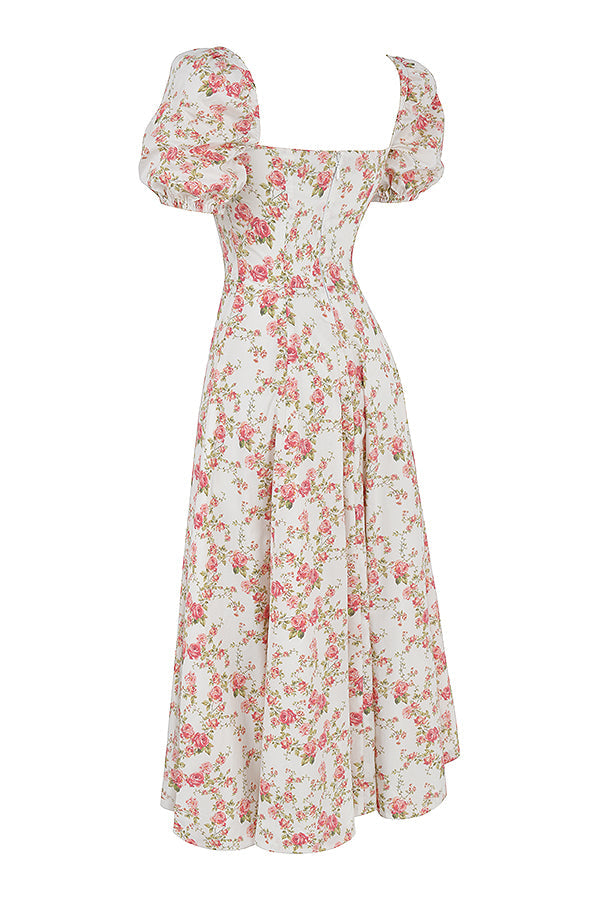 Midi solklänning med blommiga puffärmar