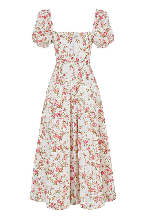 Midi solklänning med blommiga puffärmar