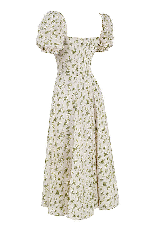 Midi solklänning med blommiga puffärmar